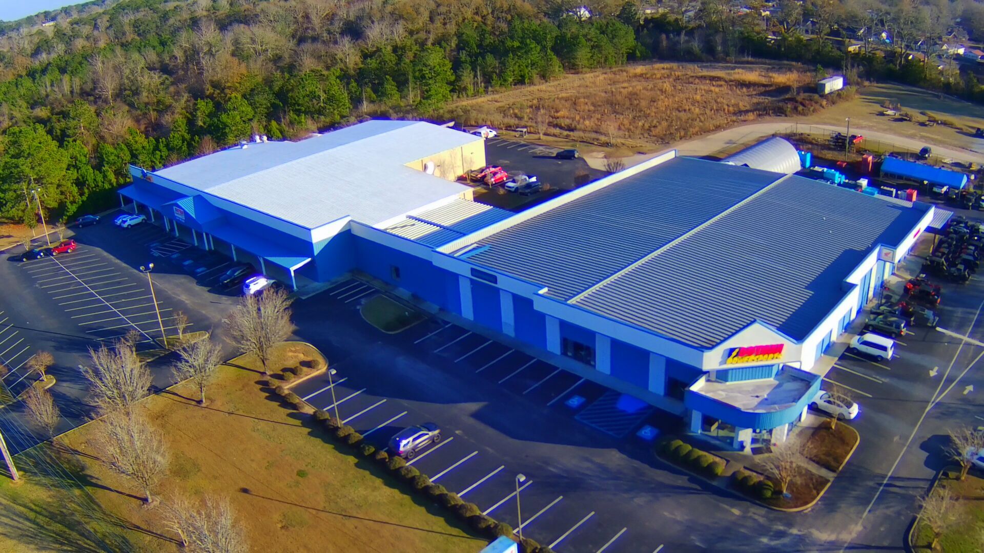 Aerial view of the dealership and lot
